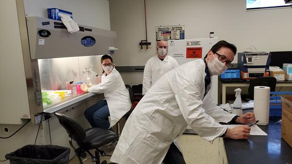 Baxter employees manufacture viral transport medium in our lab