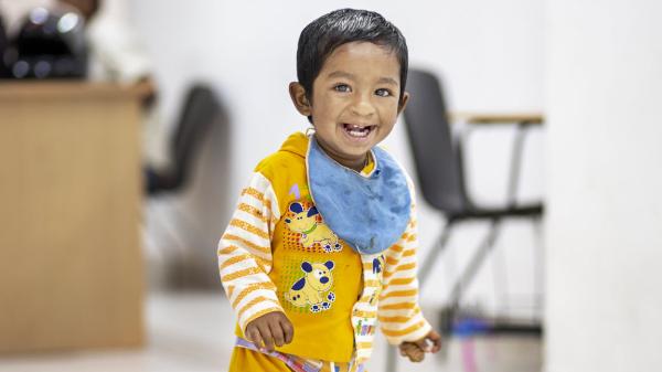 Thumbnail image of a young child smiling